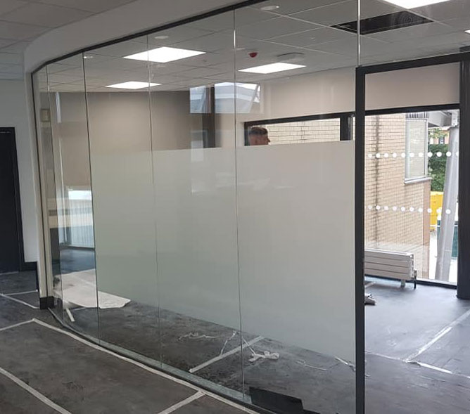 Privacy band to partitions and 50mm x 50mm manifestation to all exterior glazing and grey vinyl to hide partition wall Prospect Building Sunderland University