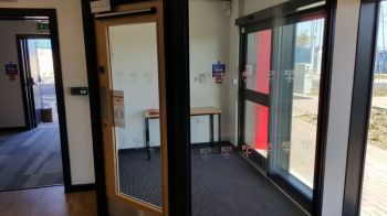 5. Privacy vinyl to all lower panes and logos to clients specifications to entrance Newcastle University