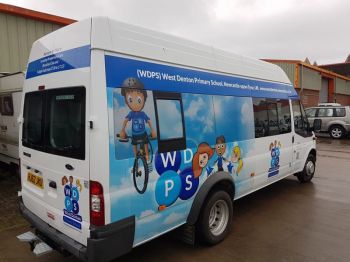 2. Minibus wrapped with printed contravision on Windows West Denton Primary School 