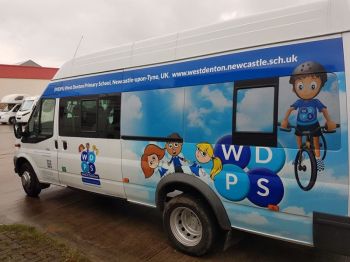 3. Minibus wrapped with printed contravision on Windows West Denton Primary School