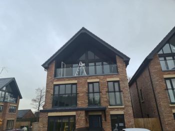 1. External grade Nimbus Grey vinyl installed to peak to block out light instead of expensive blinds at a residence in Congleton