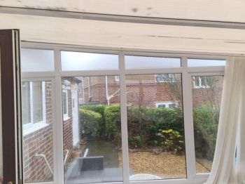 1. Before - Etched effect frost to conservatory for privacy at a Domestic works in Greenside