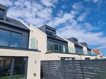 4. Clear UV anti-fade film installed to all South facing glazing, to all 4 of these stunning holiday homes at Beadnell in Northumberland